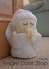 angel praying doorstop knitting pattern in white and cream chunky