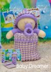 Baby Dreamer knitting pattern. Cream-colored knitted toy doll approximately 21cm long, featuring a purple onesie and a matching sleeping bag approximately 23cm long, perfect for bedtime play.