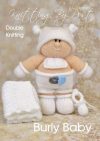 Burly Baby knitting pattern. Cream-colored knitted toy doll approximately 28cm tall, featuring a white nappy with a pin, mittens, hat, and bootees, embodying a classic baby theme.
