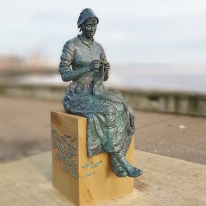 gansey girl knitting in bridlington