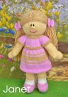Janet the Dolly knitting pattern. Cream-colored knitted toy doll approximately 35cm tall, featuring brown hair styled in pigtails, a removable pink dress, and a knitted skull cap to keep her hair in place.