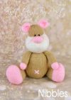 Nibbles Mouse toy knitting pattern. Knitted brown mouse with pink paws and pink ears approximately 24cm tall when seated.