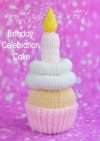 Birthday Celebration Cake knitting pattern. Knitted round cake with white icing, pink layers, and a single yellow candle on top, approximately 15cm tall.