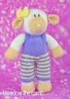 Meadow the Lamb knitting pattern – white knitted lamb soft toy wearing a purple outfit with a yellow bow, approximately 27cm tall, knitted with double knitting yarn.
