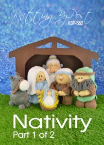 Part 1 Nativity Christmas knitting pattern booklet. Knitted figures of Mary, Joseph, baby Jesus in a manger, an angel, and a donkey, set within a stable scene