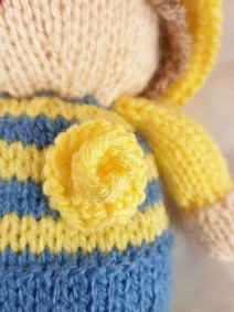 knitted doll flower