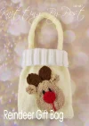 Reindeer Gift Bag knitting pattern. Knitted cream bag featuring a reindeer face with light brown antlers and a red nose, measuring approximately 15cm tall and 12cm wide, excluding the handle
