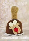Reindeer Bell knitting pattern – dark brown knitted Christmas bell decoration featuring a reindeer face with light brown antlers and a red nose, approximately 17cm tall, knitted with double knitting yarn