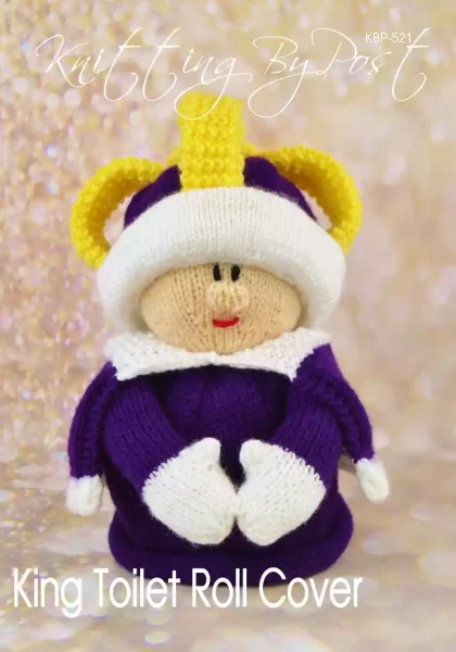 Royal King toy knitting pattern. Knitted figure representing a king, wearing a yellow crown, purple robe with white trim, and red shoes, designed as a toilet roll cover, approximately 25cm tall.