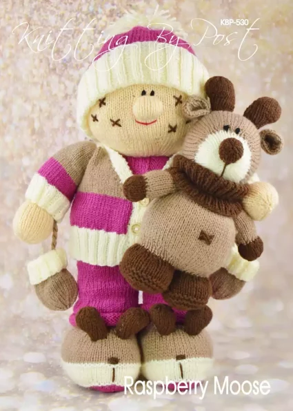 Raspberry Moose knitting pattern. Large knitted doll in raspberry-colored attire accompanied by a small brown moose toy.