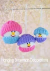Hanging Snowman Decorations knitting pattern – set of three knitted snowman ornaments in small (6cm), medium (8cm), and large (10cm) sizes, each featuring a white body with colorful hats in purple, pink, or blue, designed for double knitting yarn