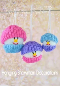 Hanging Snowman Decorations knitting pattern – set of three knitted snowman ornaments in small (6cm), medium (8cm), and large (10cm) sizes, each featuring a white body with colorful hats in purple, pink, or blue, designed for double knitting yarn