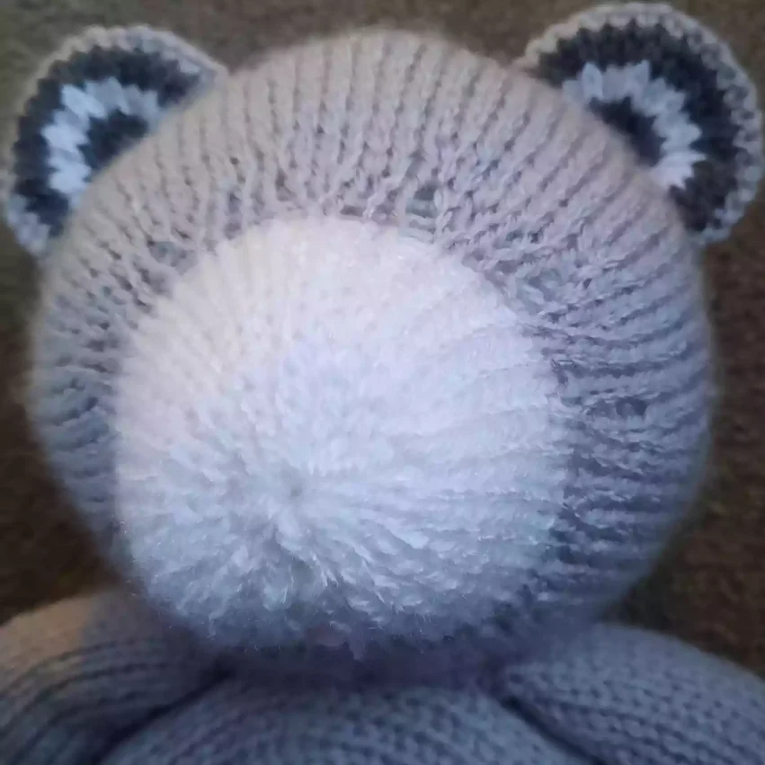 How to sew a nose to a knitted toy - step 2