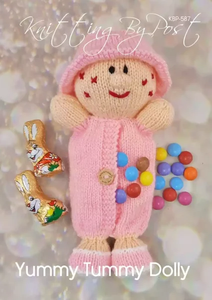 Yummy Tummy Dolly knitting pattern. Pink knitted doll with a round head, stitched facial features, and an opening in the tummy for storing sweet treats