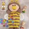 Yummy Tummy Honey Bee knitting pattern yellow and brown knitted bee soft toy with white wings and a hidden tummy pocket for storing small items, knitted with double knitting yarn