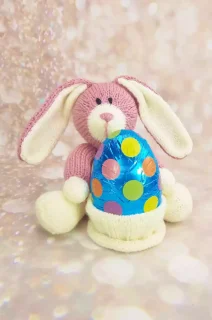 Knitted bunny soft toy with easter egg gift