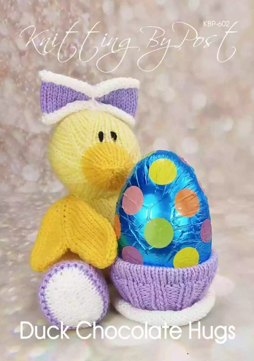 Toy knitting pattern for a yellow duck with orange wings and beak made from the Duck Chocolate Hugs Easter Egg knitting pattern