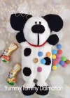 Knitted dalmatian with white body and black spots and red collar he has a pocket instead of a body for treats from yummy tummy