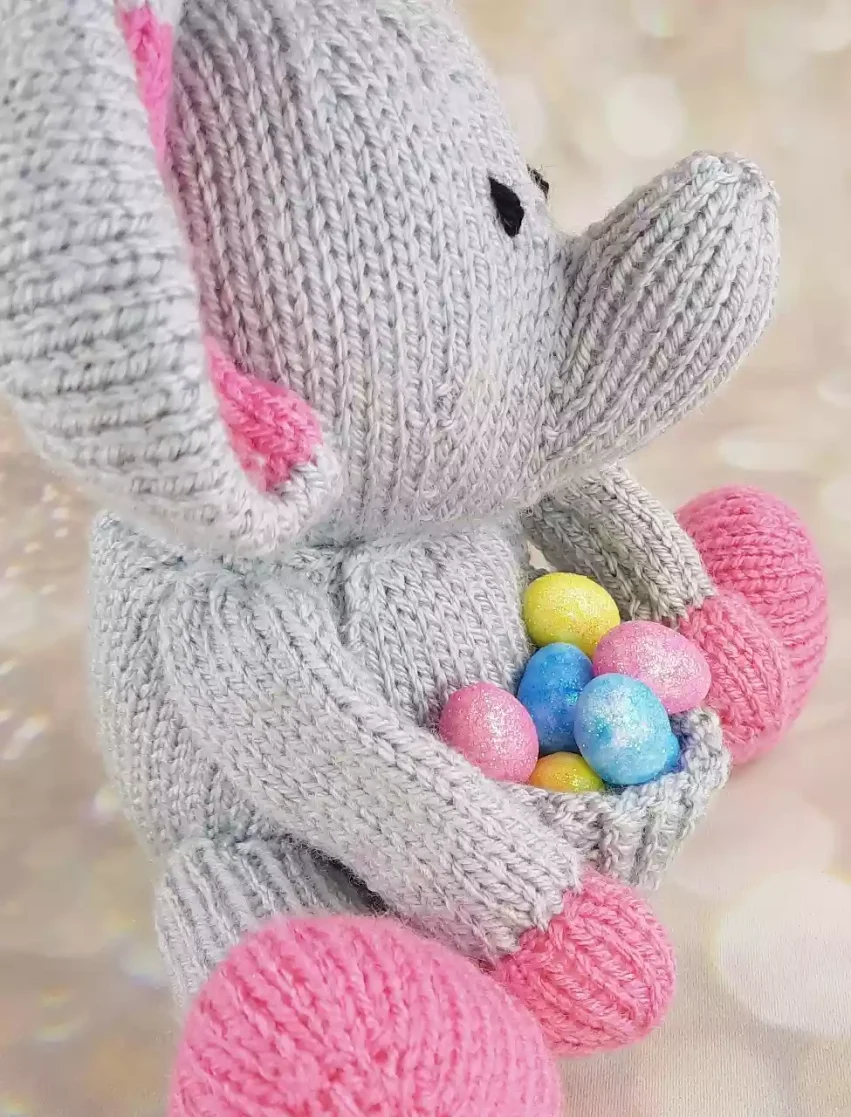 side view of elephant knitted with candy tummy